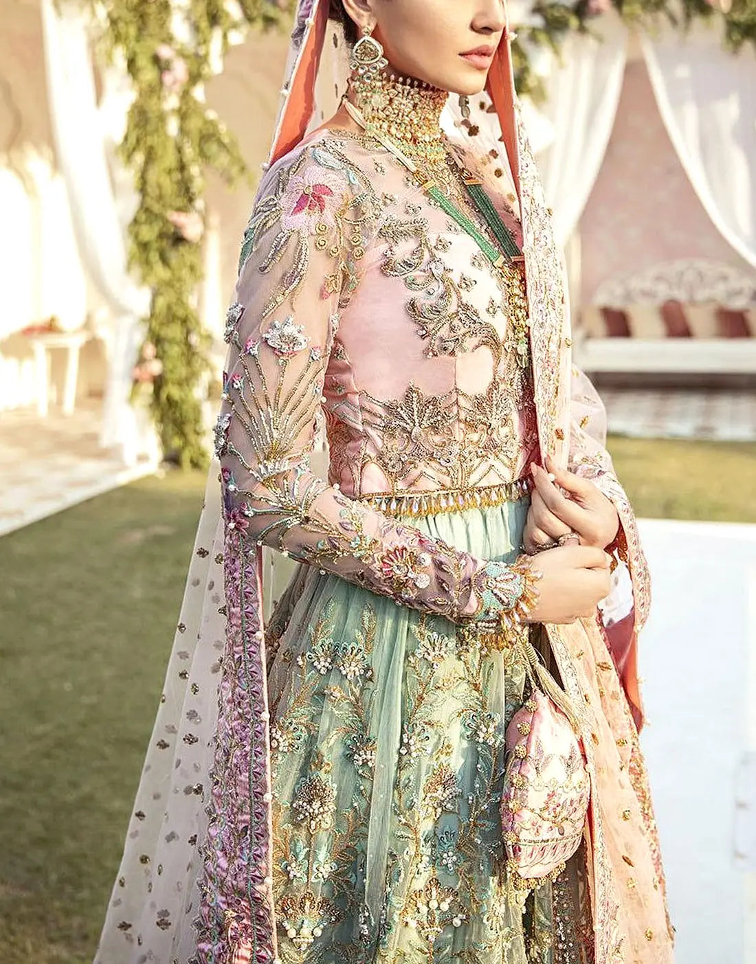Glamorous Embroidered Net Bridal Lehenga in Blush Pink & Sage Green Color with Colorful Embellishments