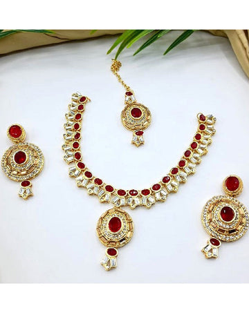 Elegant Golden Jewelry Set with Earrings & Tikka